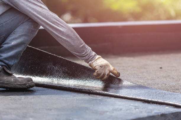 Professional Emergency Waterproofing technician working in Bennington, IN